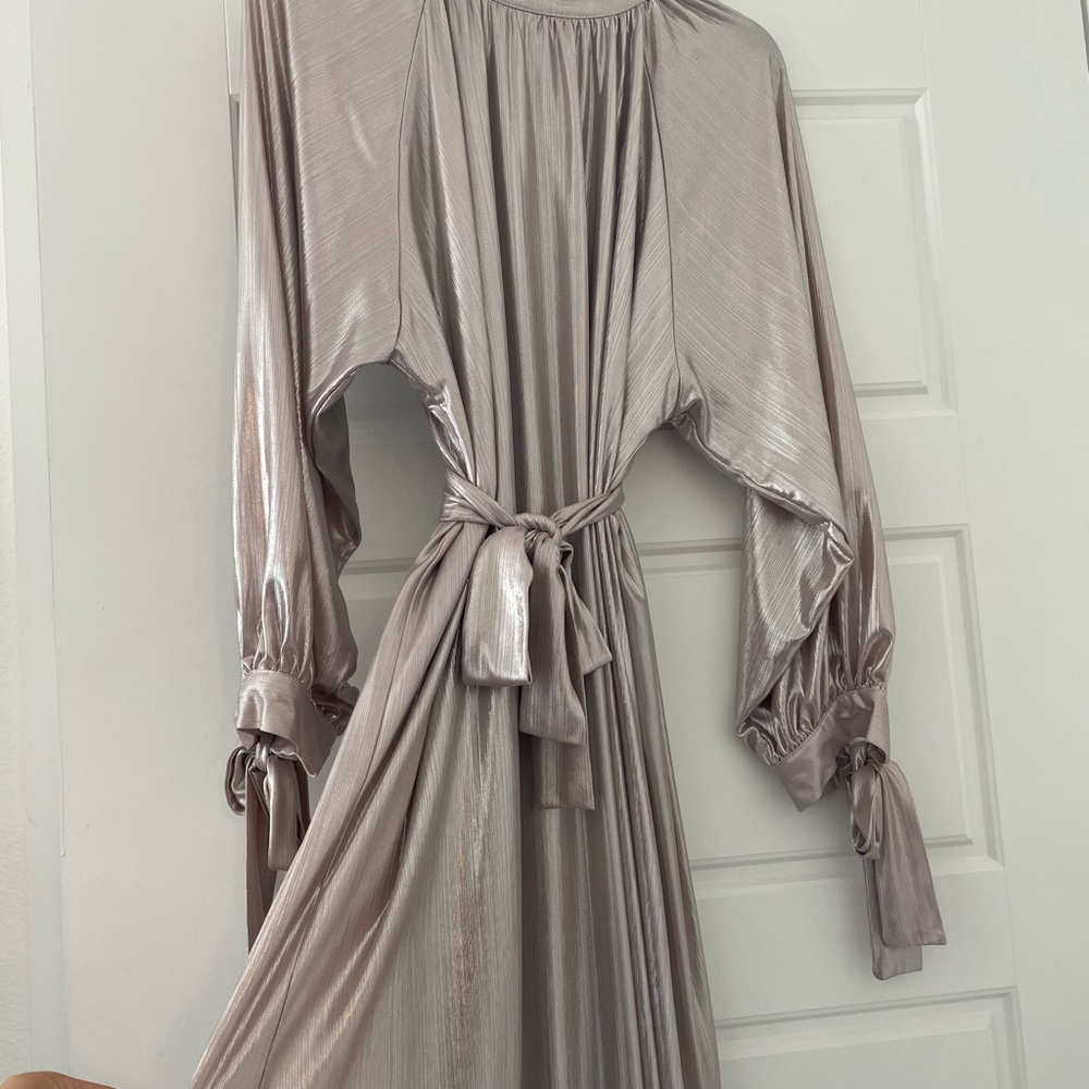 Maxi metallic dress with bow detail on sleeve and belt. Size medium